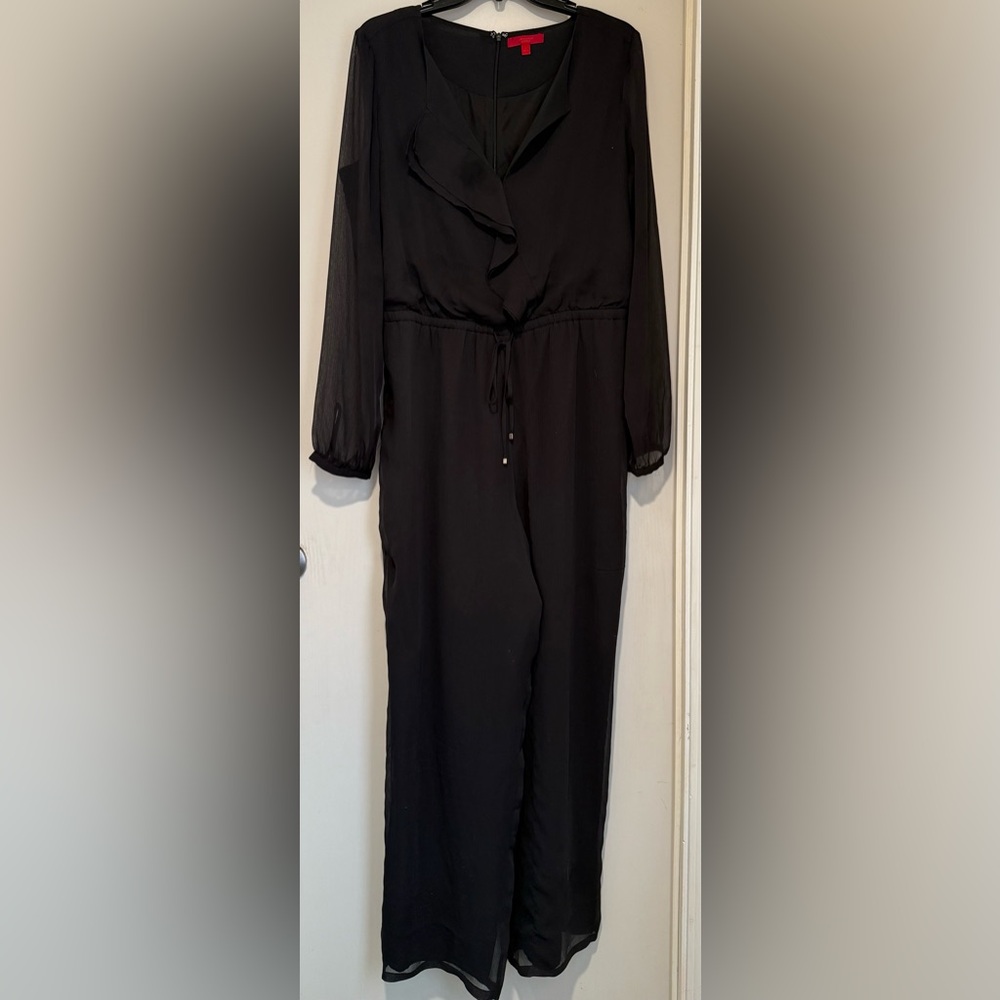 Jennifer Lopez Black Attire with Red Accents